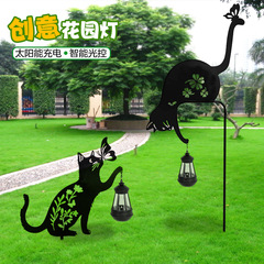 国境を越えた屋外家庭用防水芝生に鉄芸猫動物型庭園庭園装飾太陽灯を挿した