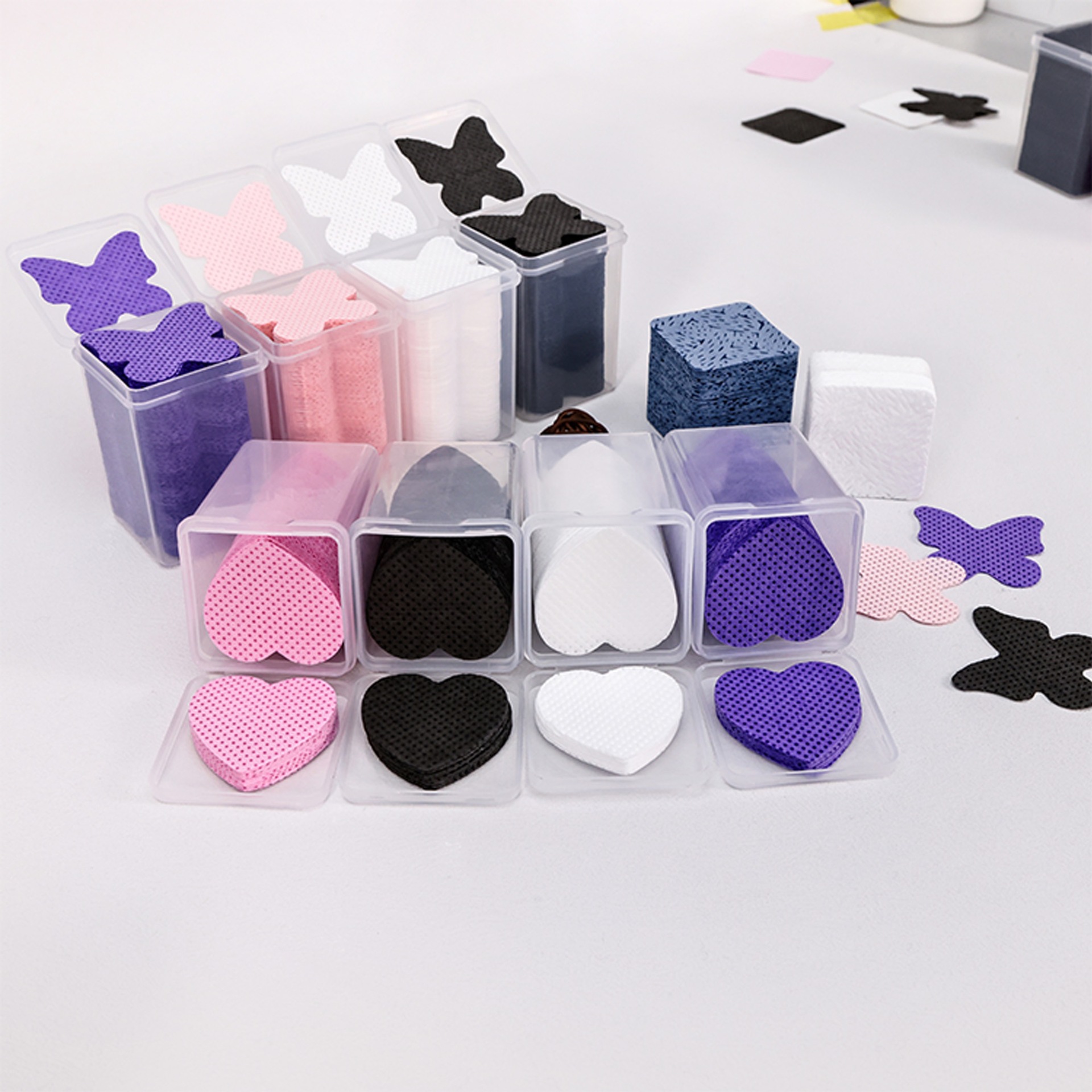 Las almohadillas de algodón para limpieza de manicura no son fáciles de perder el cabello. Toallita mágica para limpiar la boca de la botella de pegamento transfronterizo. Almohadillas de algodón para manicura de tres piezas.