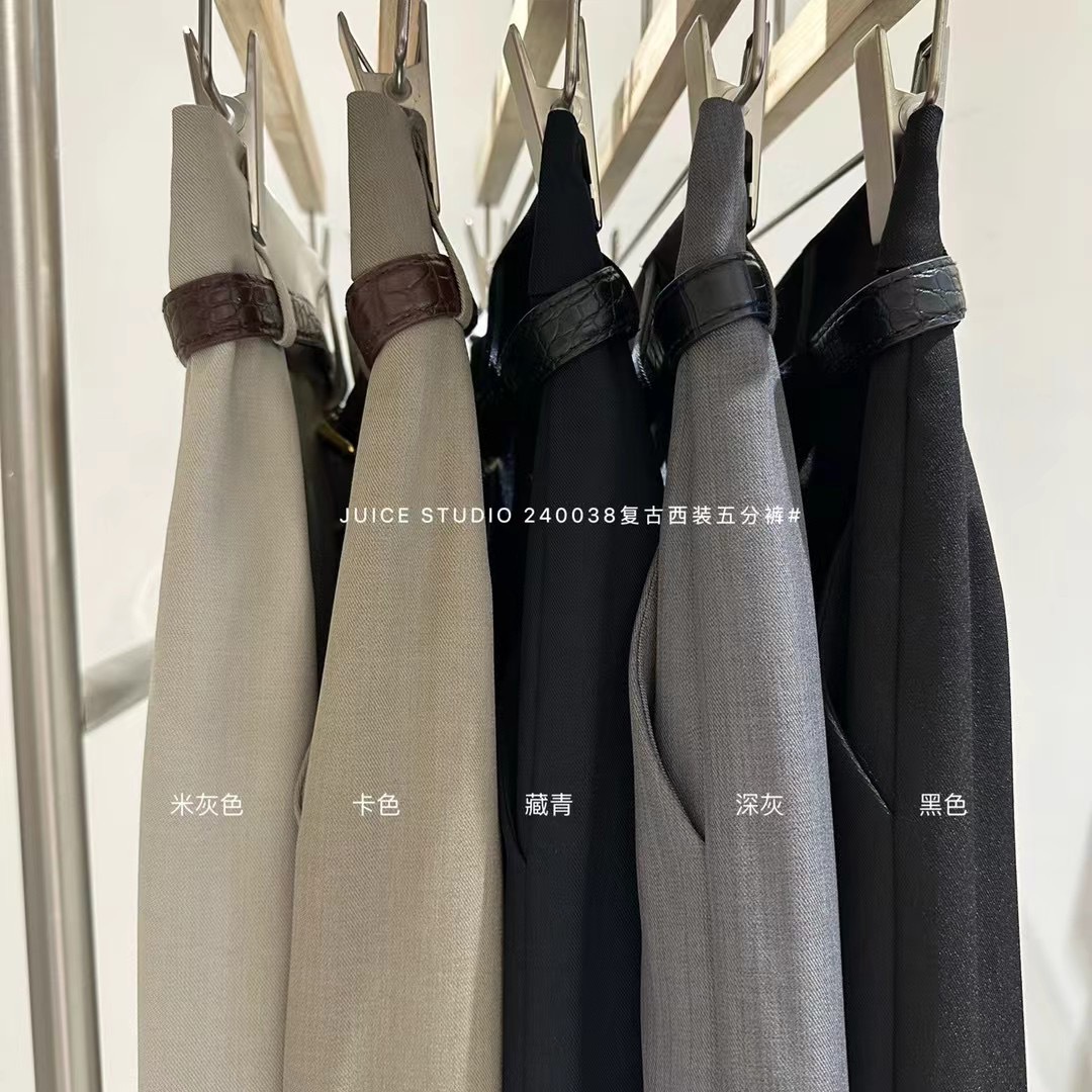 Liquidación sin devolución 240038 verano pantalones cortos casuales sueltos simples pantalones anchos delgados de cintura alta para mujer pantalones de cinco puntos