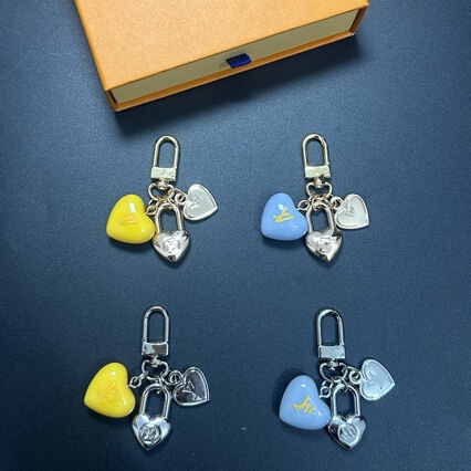 New V-Brand Louis Vuitton Blue 3D Heart Keychain Bag Charm, Available in Gold and Silver.