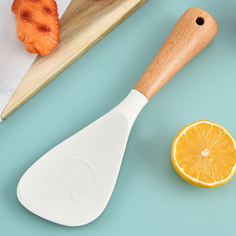 Nuevo producto creativo Cuchara de arroz de silicona vertical Cuchara de arroz de silicona de grado alimenticio Cuchara de arroz antiadherente Pala de arroz doméstica