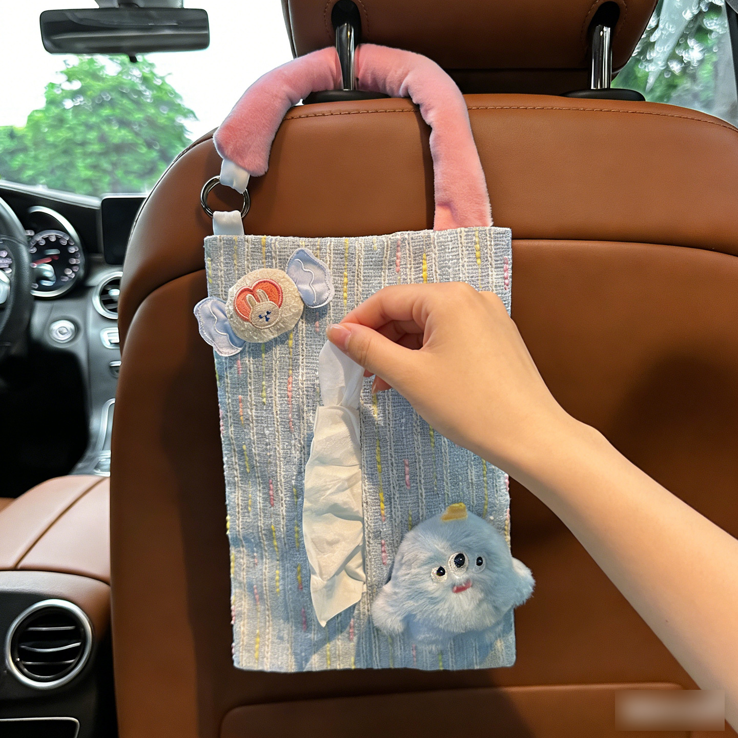 Bolsa de toallas de automóvil personalidad bolsa de dibujos animados lindos arco amor asiento de automóvil colgante sensación de mujer ins