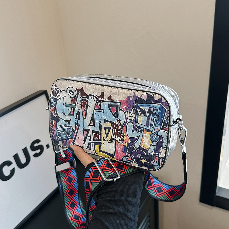 Bolso cuadrado pequeño estilo explosivo transfronterizo, graffiti de personalidad femenina, bolso puenting, bolso de cámara con correa de hombro ancha de moda, bolso de mensajero de hombro de todo fósforo
