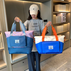 New color matching women's hand luggage bag, men's short-distance business trip, sports and fitness bag, storage boarding bag, foldable style