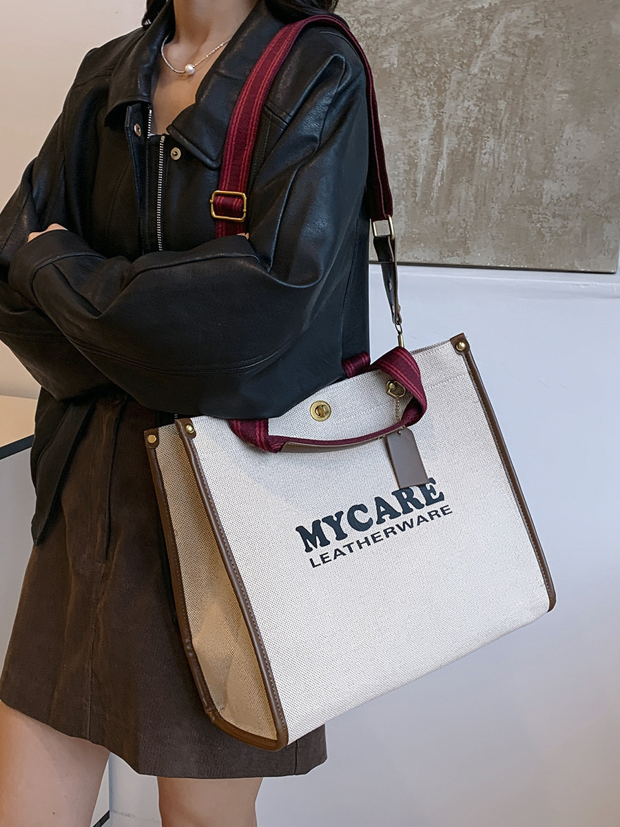 Bolsa de mano de lona de gran capacidad para mujeres 2024 nueva moda impresa letras mochilas bolsa de viaje casual