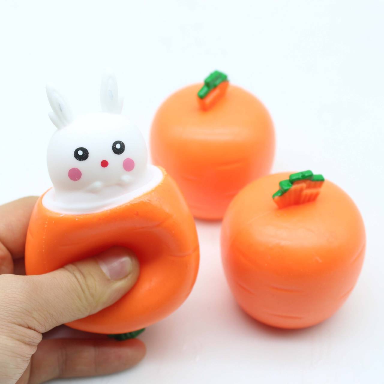 Cute and creative little white rabbit carrot cup pinch and squeeze to vent rabbit cup decompression vent toy for primary school students