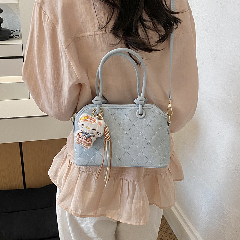 甜美手提小包包女2026新款时尚手拎水桶包夏季流行通勤单肩斜挎包