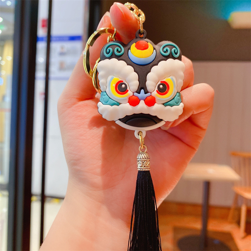 国潮のお祝いの目が覚めるライオンのキーホルダーは精巧な新年の小さい贈り物の自動車のストラップを掛けてアクセサリーの子供機を包みます。|undefined