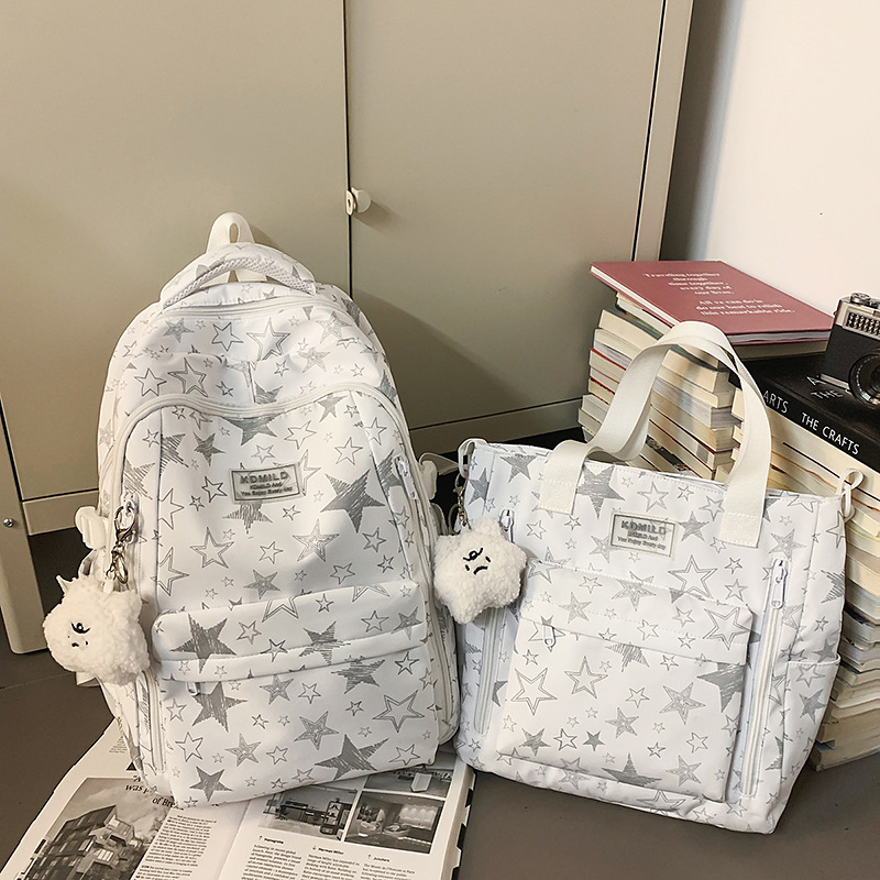 Cross-border 2026 nicho universal estrellas auriculares mochila de gran capacidad mochila de graffiti de viaje de estudiantes universitarios