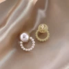 Golden ear clips from pearl