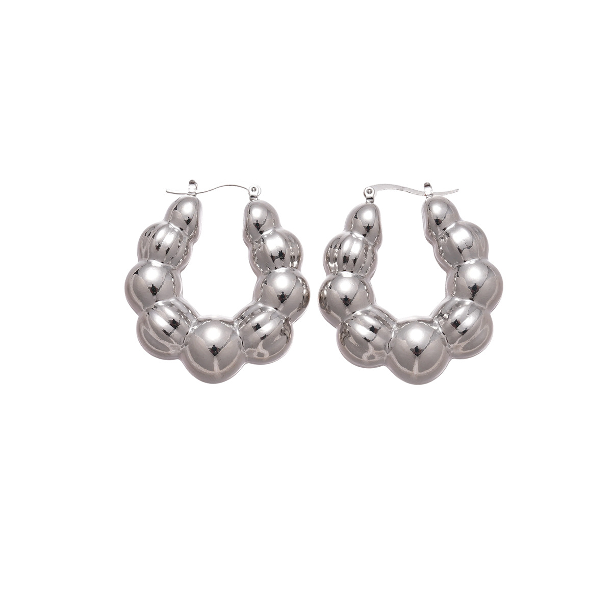 Europa y los Estados Unidos metal brillante superficie irregular nicho de pendientes de alta sensación única temperamento de moda personalidad pendientes mujeres