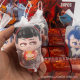 What is the surrounding hand-held doll decompression children's toy lottery stall wholesale factory slow rebound pinch music blind box