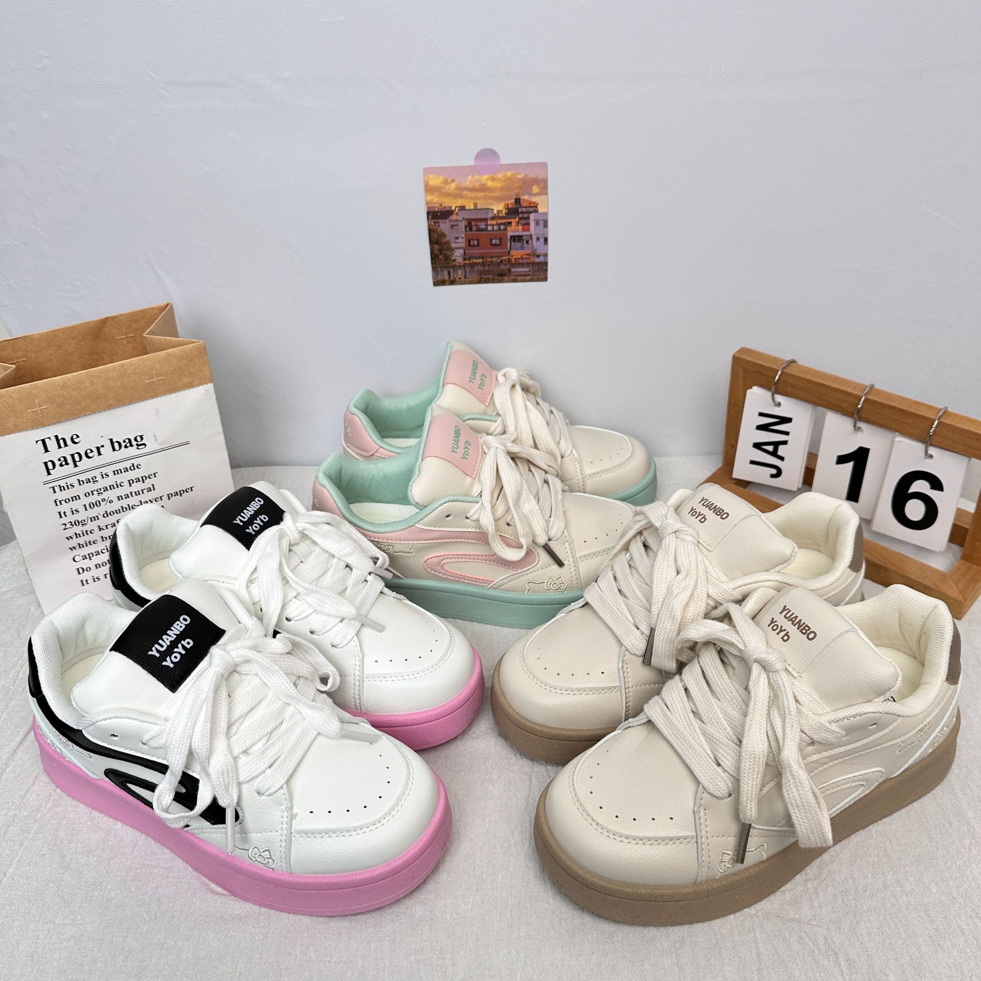 Yuanbo original blanco en polvo costura gato diseño zapatos de pan mujeres retro nicho zapatos de skate zapatos deportivos de suela gruesa en nombre del cabello