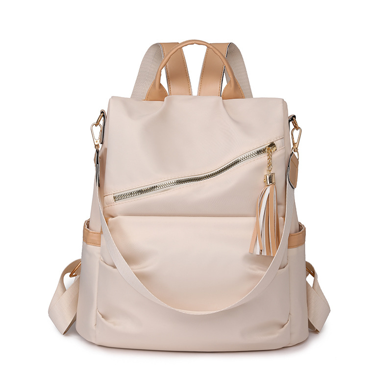 Spot al por mayor 2025 nueva mochila antirrobo casual para mujer moda borla mochila para mujer de gran capacidad marea