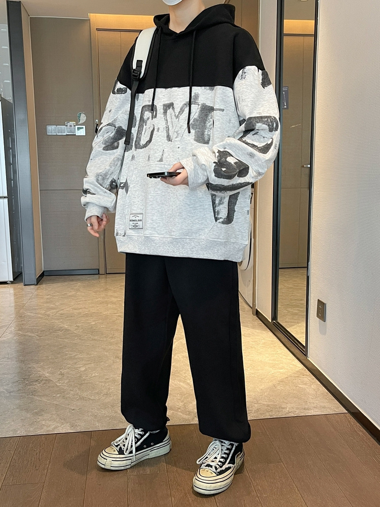 Los fabricantes de origen pueden personalizar el logotipo de los hombres jóvenes primavera y otoño moda suelta suéter con capucha suéter pantalones traje hombres