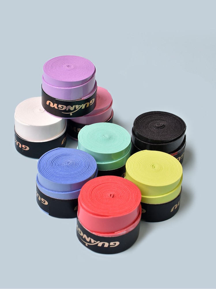 Cinta adhesiva para empuñadura de raqueta de bádminton Guangyu, plana, de PU, elástica, de alta elasticidad, banda de enrollamiento, cinta absorbente de sudor, venta al por mayor.