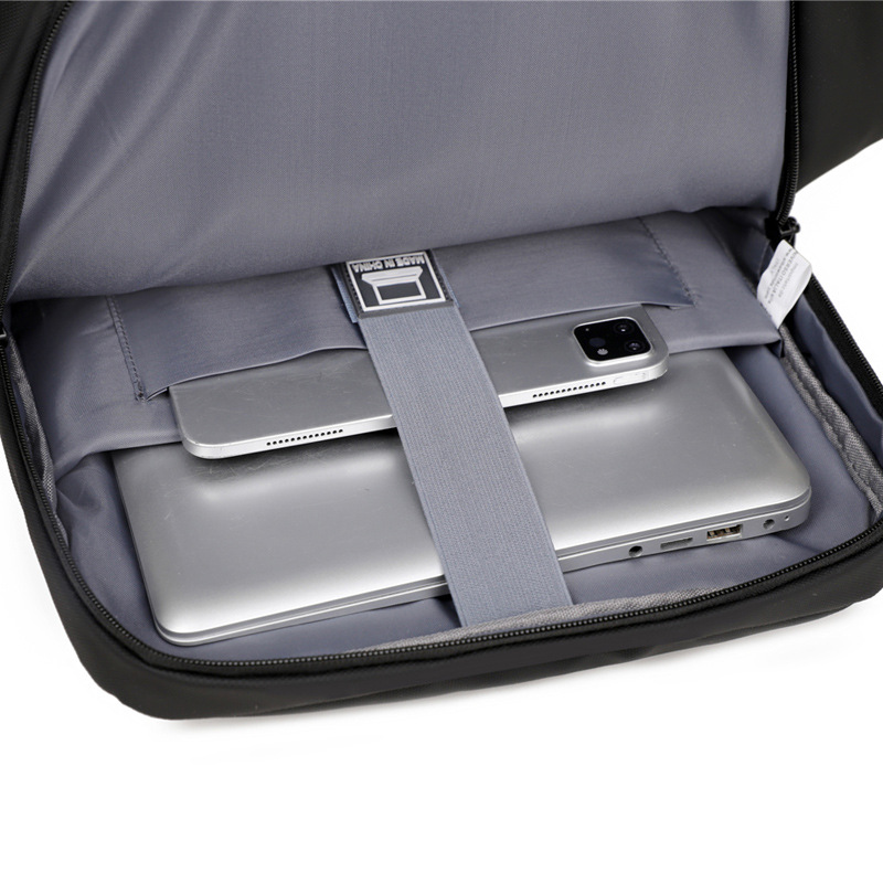 Nueva mochila de gran capacidad para hombres, mochila de cercanías de moda casual, anti-salpicaduras, resistente al desgaste, bolso de computadora de negocios