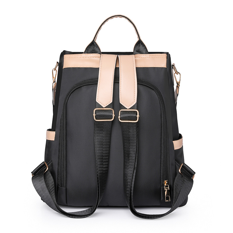 Mochila antirrobo de ocio al aire libre mujer 2024 nueva moda de nailon color de contraste borla viaje mochila de doble uso al por mayor