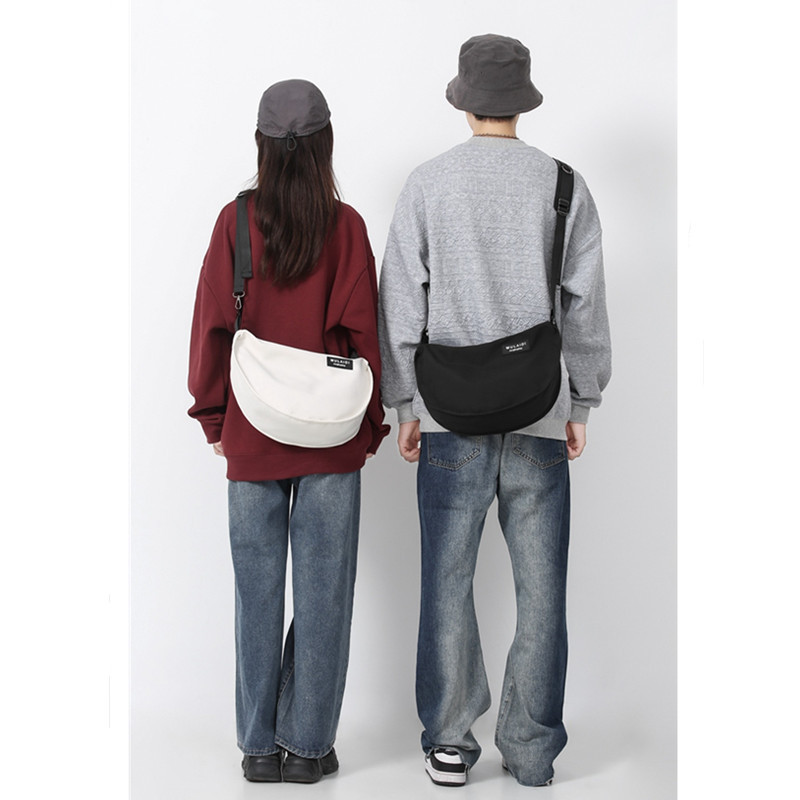 Japanese-style casual dumpling bags, sporty crossbody bags, large-capacity canvas bags for women, single-shoulder commuting bags for students to class, trendy undefined