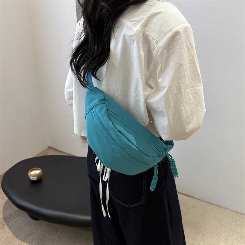 Bolso de pecho de moda simple de verano 2024 nueva moda de nicho deportivo bolso de cintura casual simple bolso de hombro para mujeres
