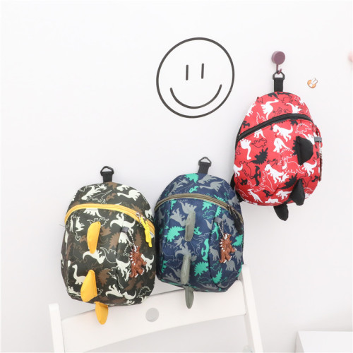Children's schoolbag boy's cute dinosaur print backpack Korean version foreign trade new kindergarten primary school student anti-lost bag