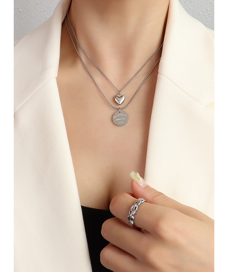 Collier double couche cœur disque en acier titane doré_voghion.com