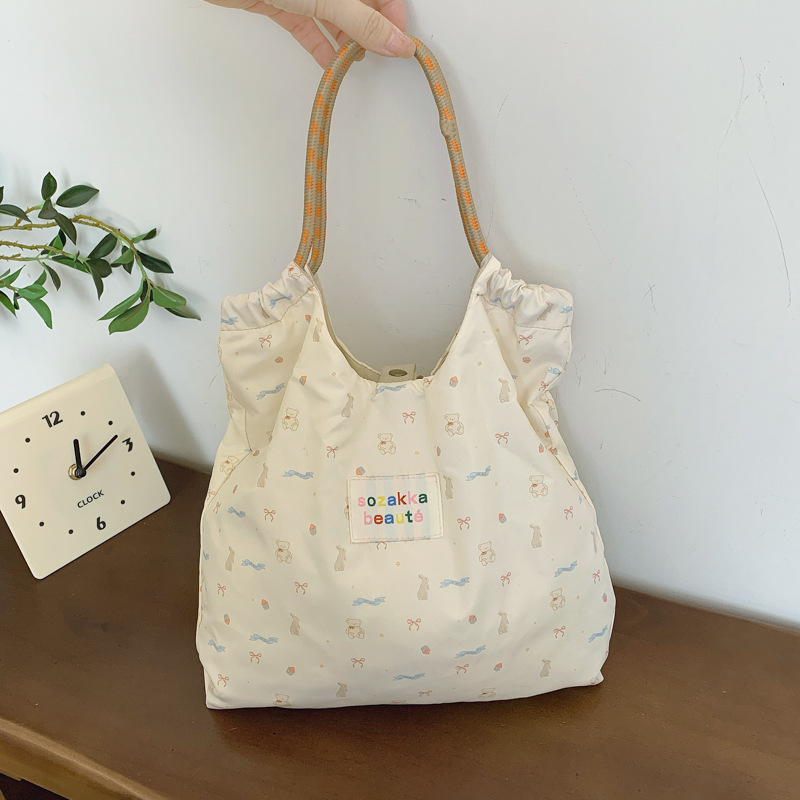 Japonés lindo y suave estudiante de gran capacidad bolso de hombro de mujer versión coreana pequeña fresca impresión de chicas bolsas de compras portátiles
