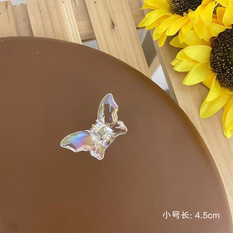 Colorido transparente humano pescado pinza de pelo grande Super Hada mariposa horquilla hembra espalda cuchara updo tiburón pelo clip accesorios para el cabello al por mayor