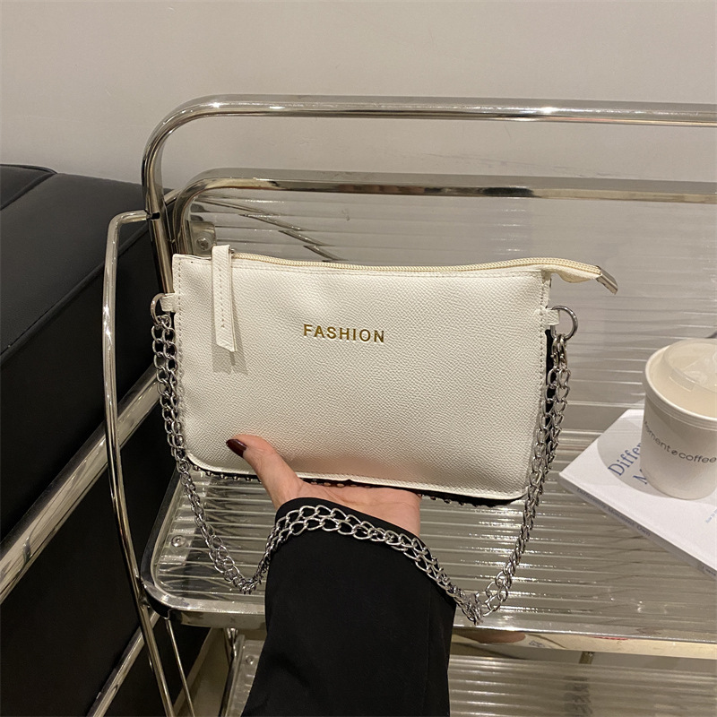 Casual coreano simple mochila personalidad bolso pequeño para mujeres 2025 primavera nueva moda perlas simple bolso de hombro