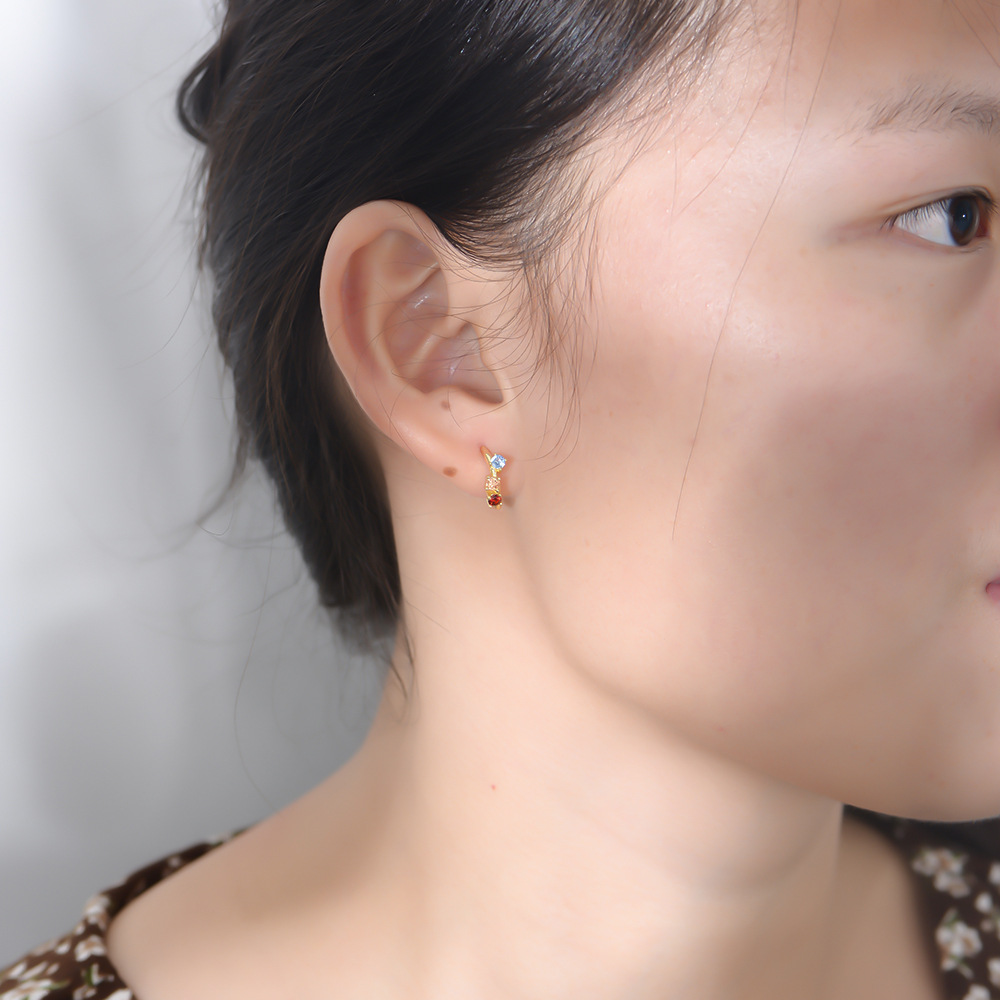 Europa y América ins pendientes de alto sentido nicho s925 plata esterlina personalidad asimétrica color circón pendientes de la borla