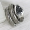 Silver, black dial