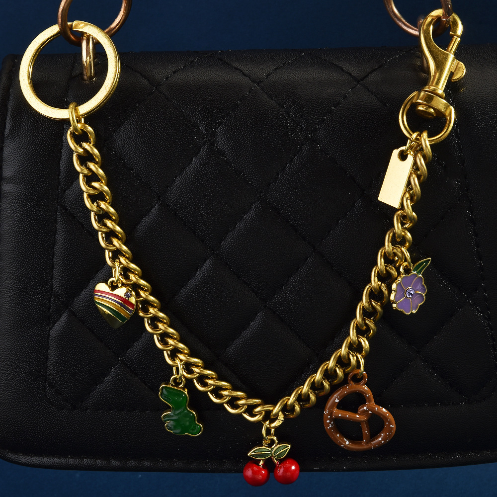 Nuevo estilo transfronterizo europeo y americano venta caliente dinosaurio amor concha cereza herradura fresa manzana bolso de cadena colgante bolso de mensajero mujer