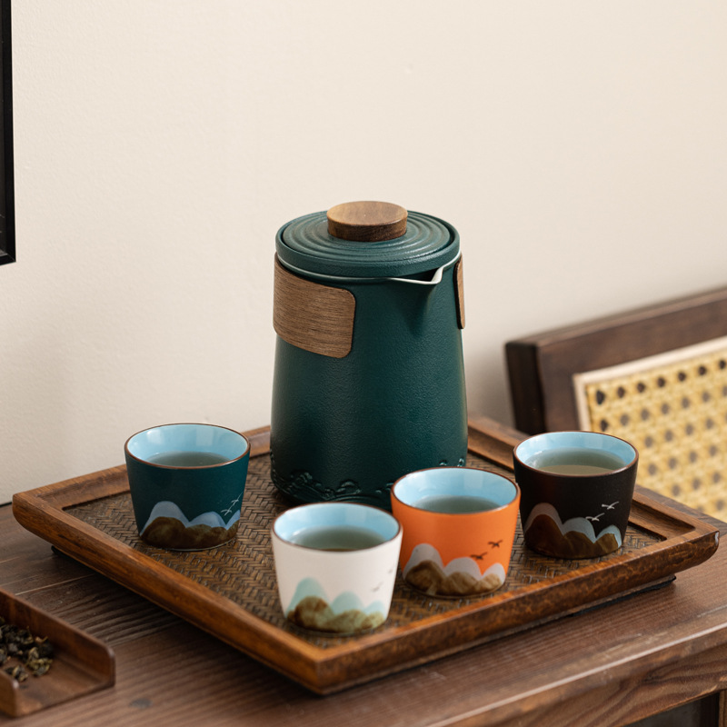 Conjunto de té de viaje de cerámica de estilo chino regalos de negocios de talla de taza de marca regalo de mano de empresa estatal bienestar
