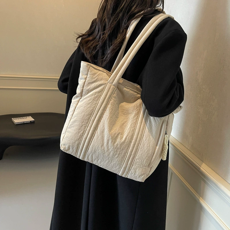 Demi-season down jacket, universal capacious one-shoulder bag