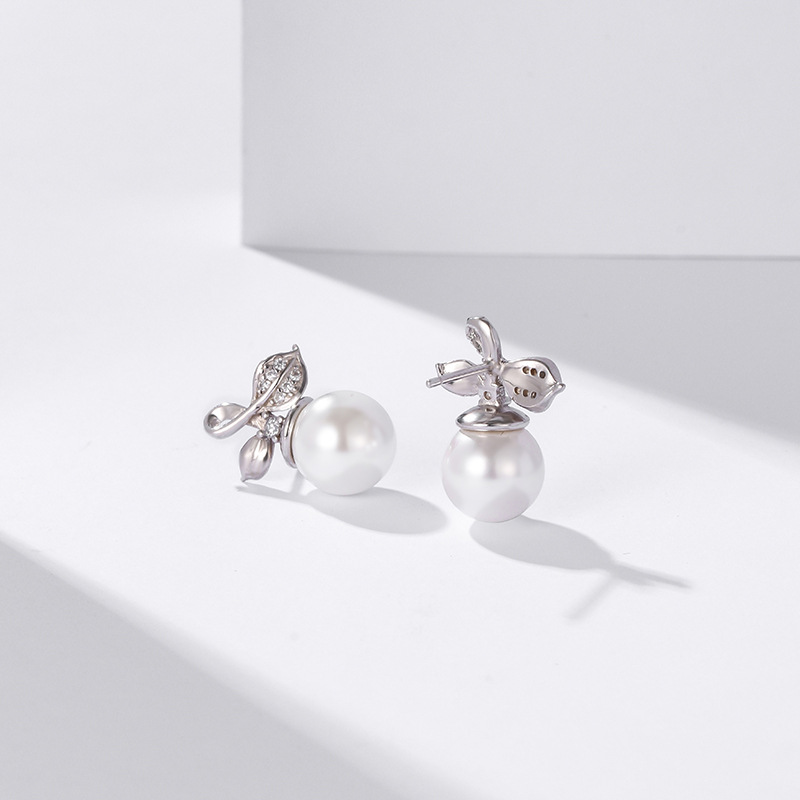 Japonés y coreano elegante hoja fresca perla joyería oído s925 plata esterlina con incrustaciones de diamantes ZIRCON pendientes para las mujeres al por mayor