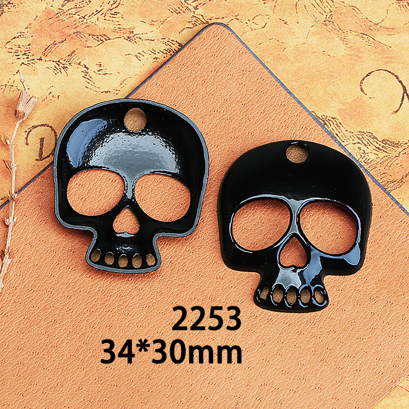 Aleación máscara cráneo electroforesis negro accesorios material al por mayor DIY colgante joyería Cruz alas negro colgante