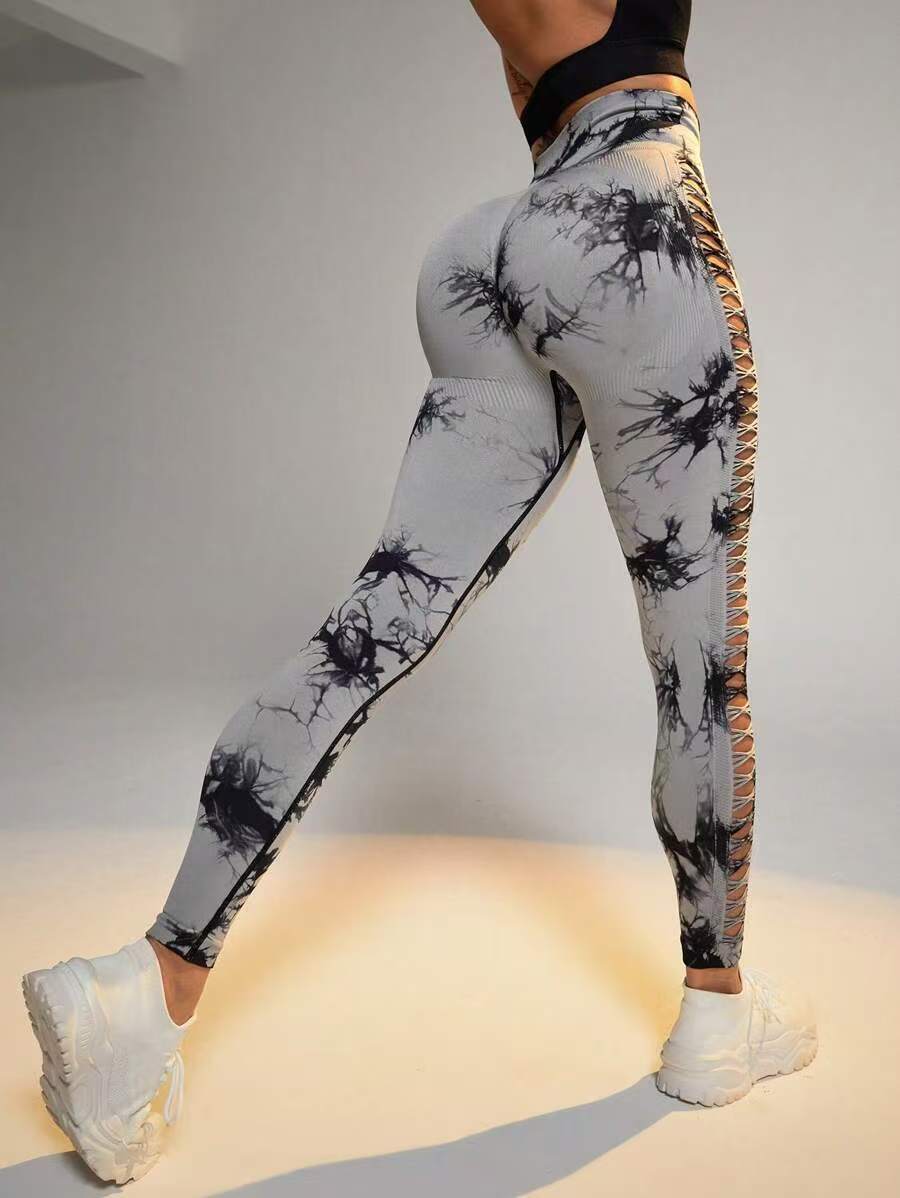Transfronterizo de cintura alta hueco atado teñido de camisa de mel桃 hips fitness deportivo pantalones ajustados malla sexy ropa de yoga para mujeres
