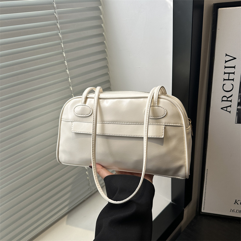 Bolso de bolos portátil con cremallera de múltiples bolsillos de gran capacidad de diseño de nicho para mujer 2025 nuevo bolso de hombro de cercanías para axila