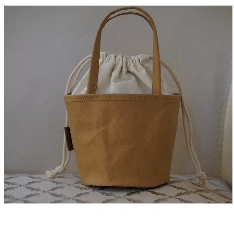 水洗牛皮纸拼接帆布袋抽绳手提袋杜邦纸礼品包装袋水桶袋面包袋