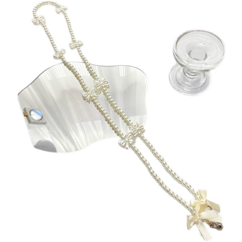 Brand strap, phone case, shoulder bag from pearl, backpack with bow