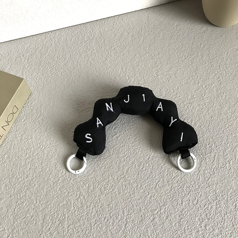 黑色毛毛虫手提