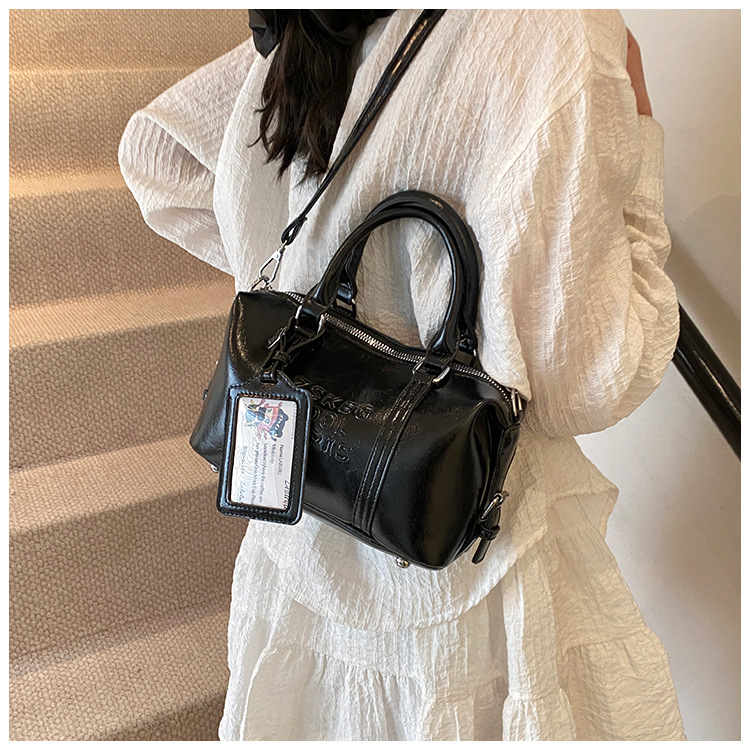 Korean version hand-held bowling bag for women 2025 new retro niche commuting pillow bag versatile single-shoulder crossbody bag undefined