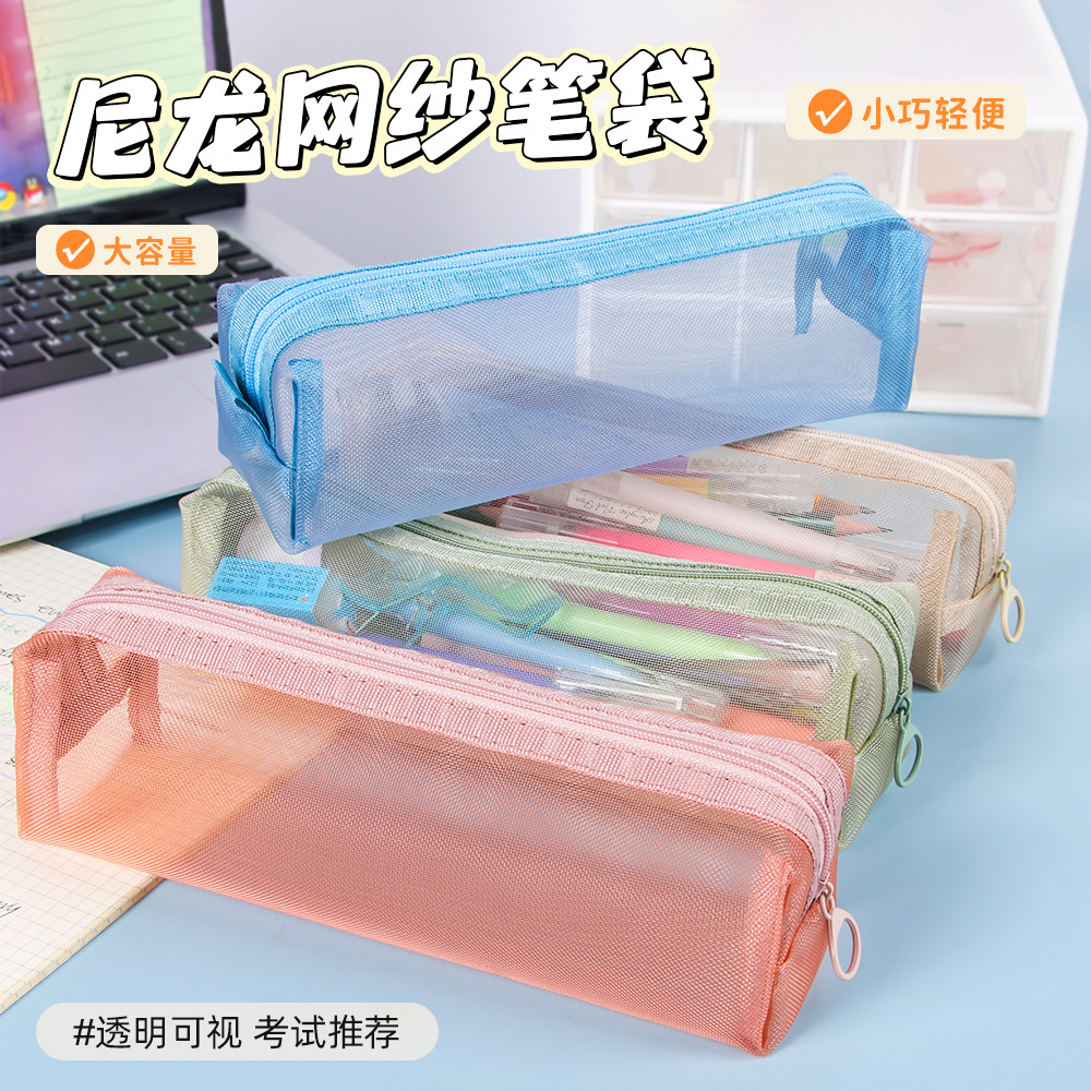 Bolsa de lápiz de malla de nylon transparente creativa ins en la caja de lápiz de papelería de gran capacidad especial para niños y niñas