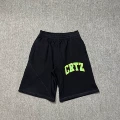 823 black and green shorts