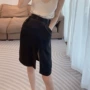 口袋中长修身高腰半身裙