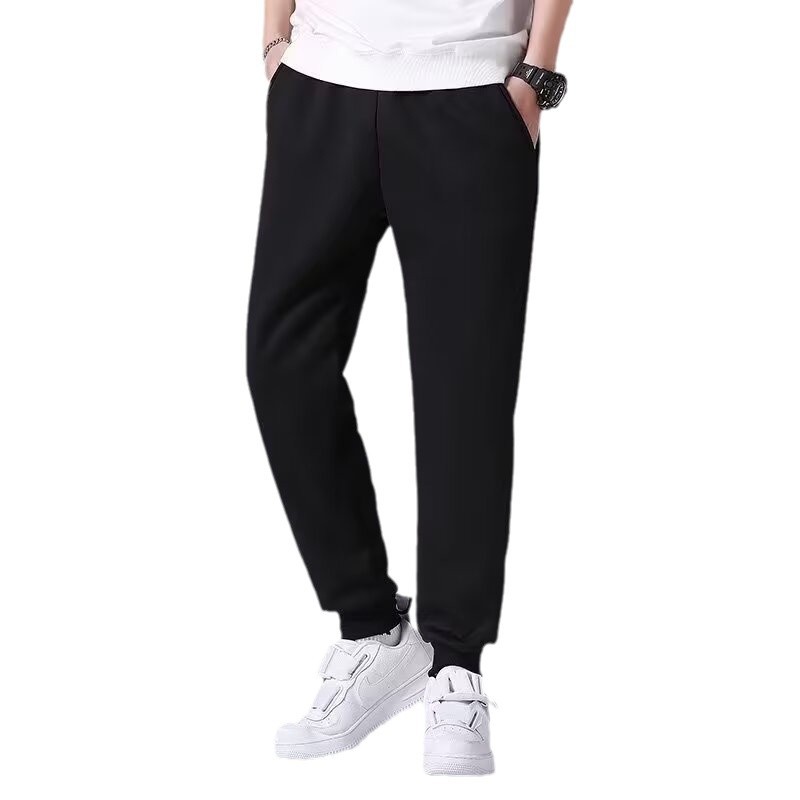 秋冬のベルベットのカジュアルな足首のズボンの男性の日本風の羊の小毛の大きいサイズのスポーツのズボンのゆったりとしたシンプルな純色のズボン