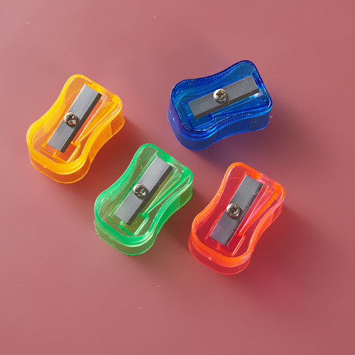 Cute candy-colored small pencil sharpener student single-hole pencil sharpener plastic cartoon creative manual pencil sharpener wholesale