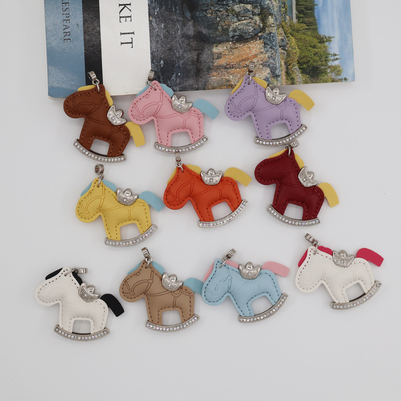 Cross-border bestseller: "Get Rich Soon" diamond-studded keychain, PU rocking horse bag pendant, creative ins-style little horse, factory wholesale