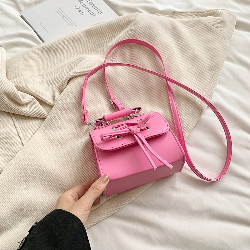 Diseño coreano de nicho bolso de mujer 2024 mini personalidad versátil bolso de moda arco de hombro bolso pequeño