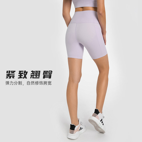 Spring and summer new style stitched side pocket sports quarter pants for women with high waist and hip lift elastic tight fitness yoga shorts